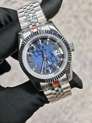 Sapphire Sky blue wave dial front view